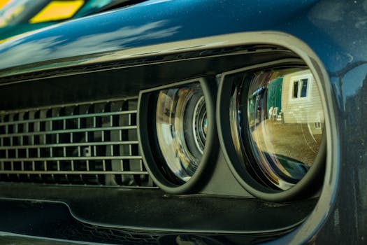 Detailed view of an American muscle car headlight