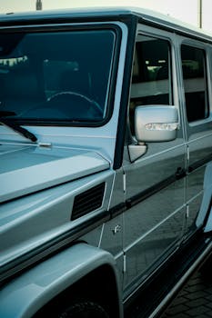 A detailed side view of a luxury SUV with chrome a