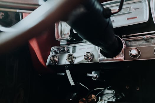 Close up of a vintage car dashboard showcasing cla