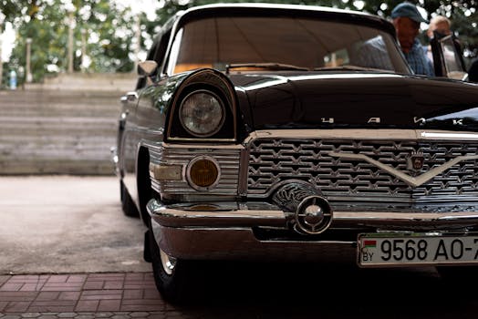 Close up view of a classic black vintage car showc